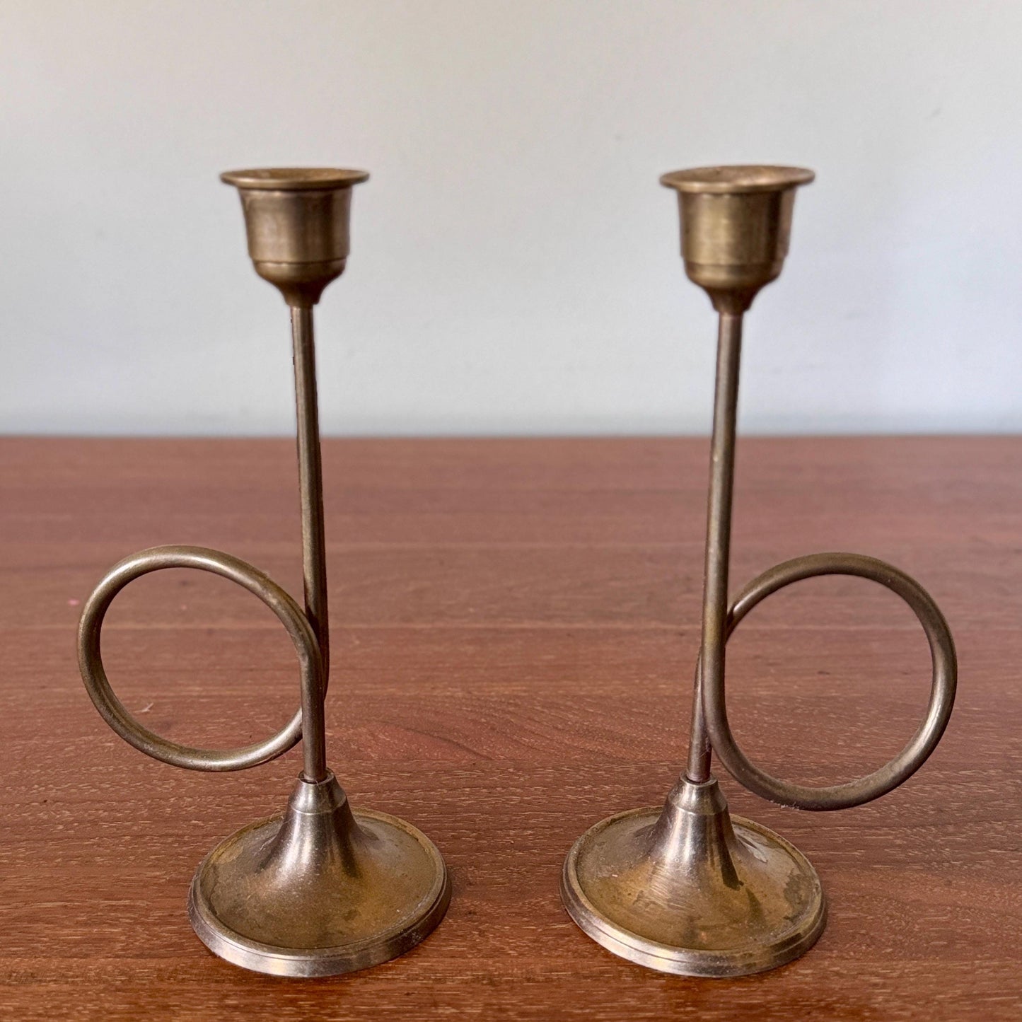 Pair of Mid-Century Modern Brass Trumpet Loop Candlesticks – 7.5” Sculptural Taper Holders