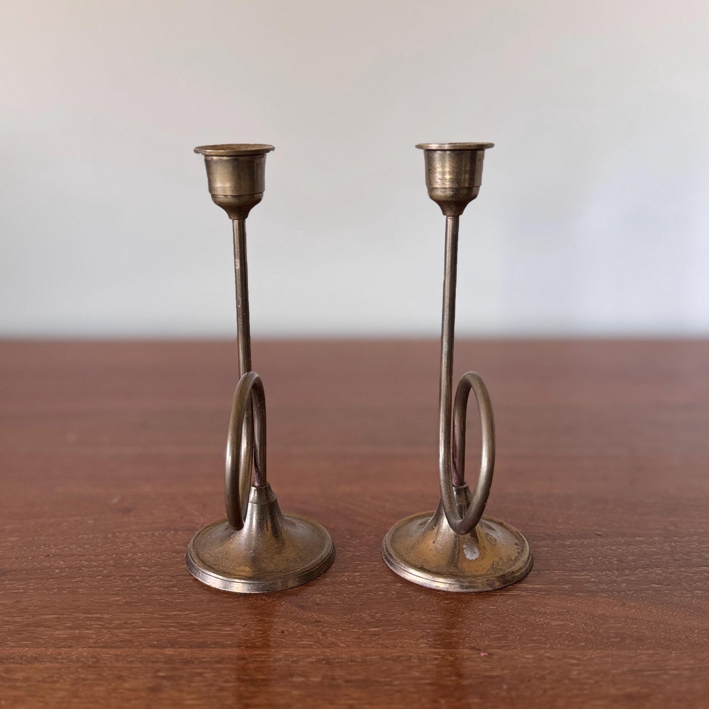 Pair of Mid-Century Modern Brass Trumpet Loop Candlesticks – 7.5” Sculptural Taper Holders
