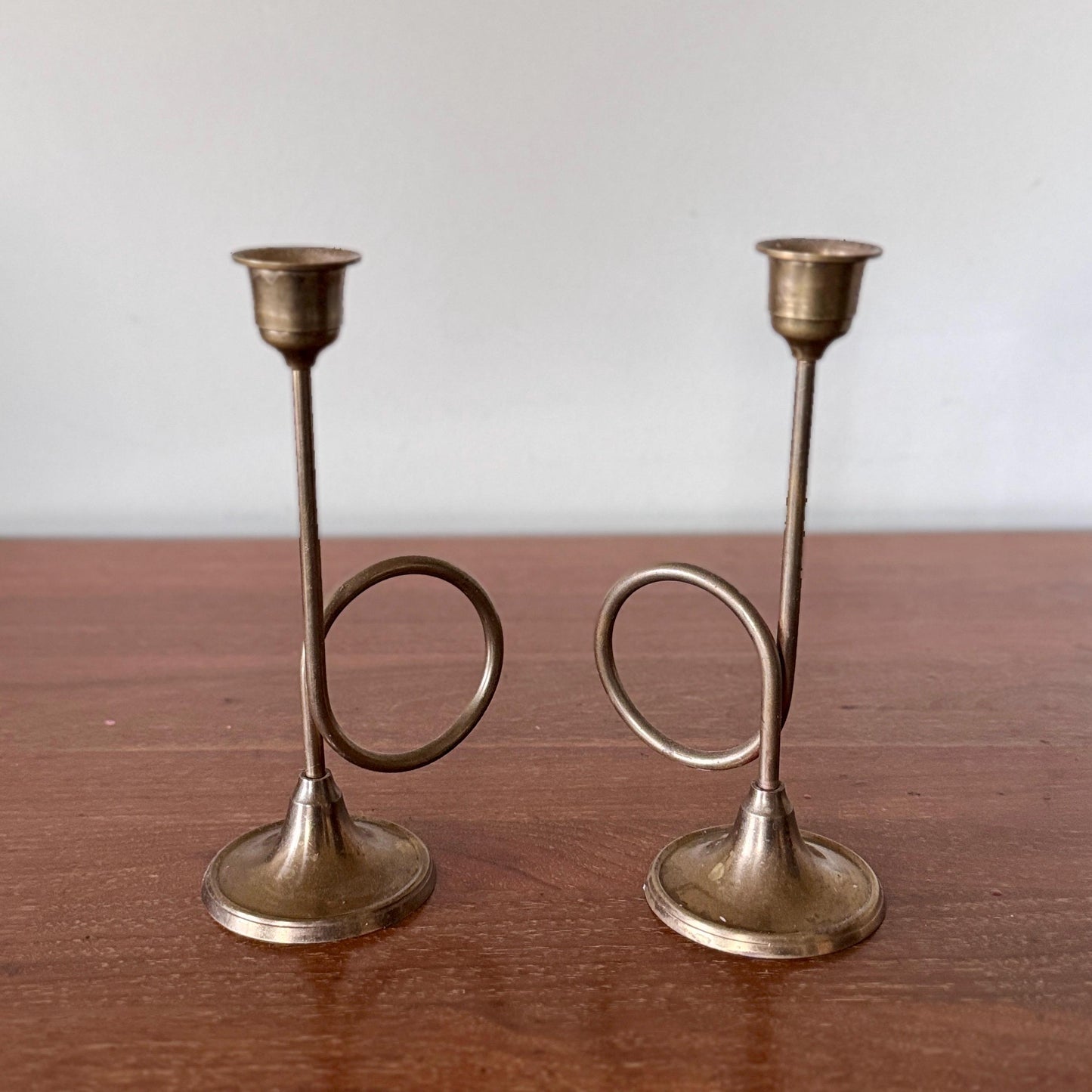 Pair of Mid-Century Modern Brass Trumpet Loop Candlesticks – 7.5” Sculptural Taper Holders