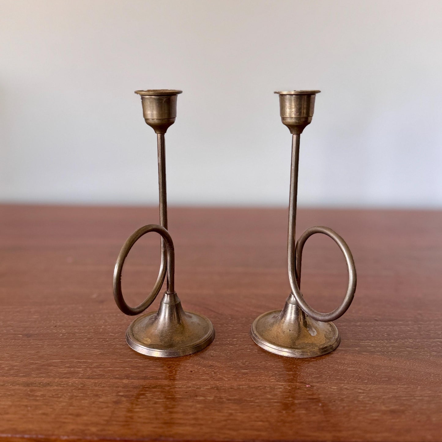 Pair of Mid-Century Modern Brass Trumpet Loop Candlesticks – 7.5” Sculptural Taper Holders