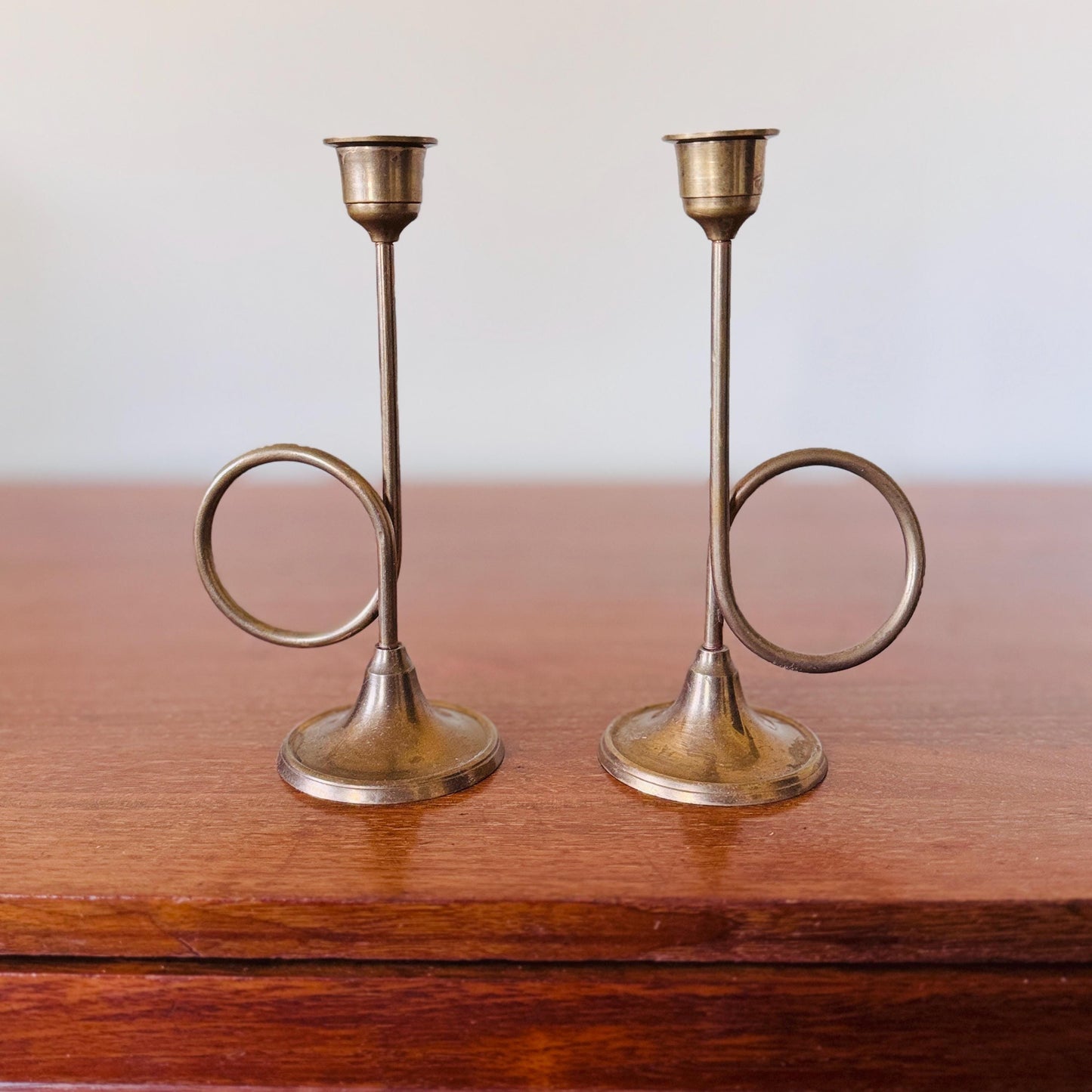 Pair of Mid-Century Modern Brass Trumpet Loop Candlesticks – 7.5” Sculptural Taper Holders