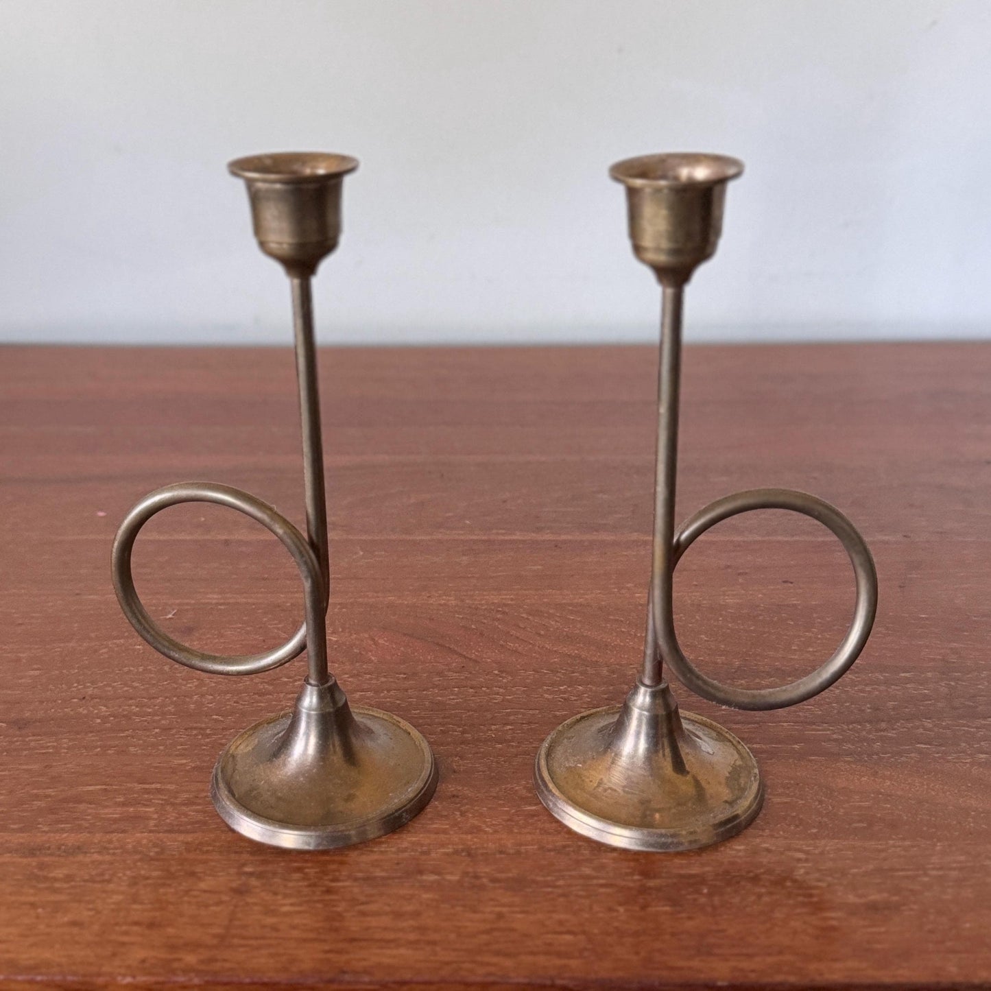 Pair of Mid-Century Modern Brass Trumpet Loop Candlesticks – 7.5” Sculptural Taper Holders